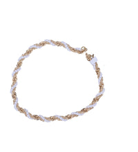 Gold and white braided bracelet 