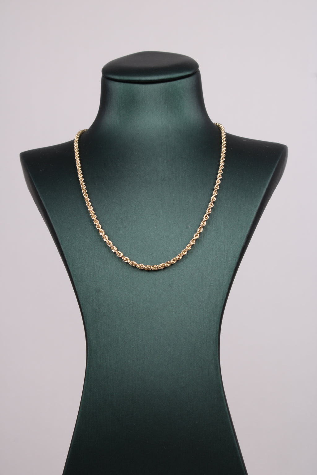 عقد النسيج الذهبي